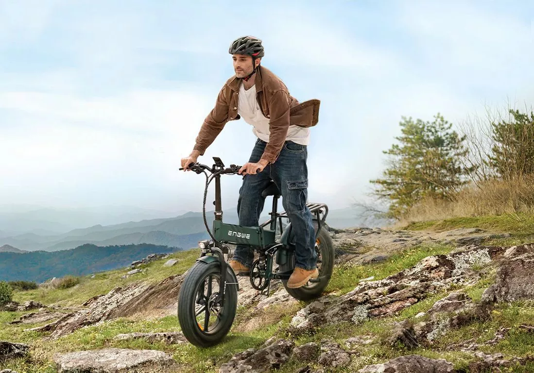 Full suspension, fat tires, hydraulic brakes, rear cargo rack, powerful hub motor and 68-mile battery