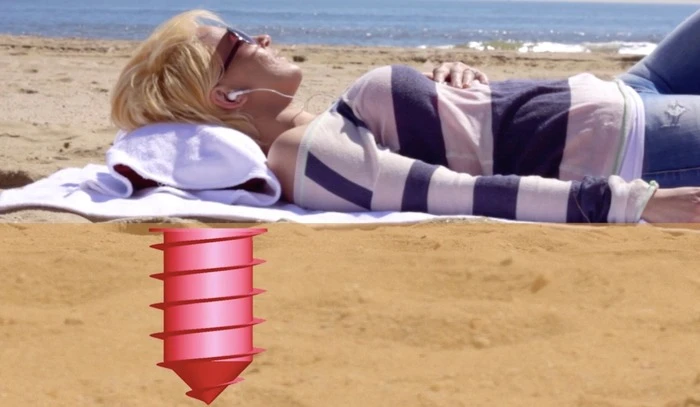 Beach Vault is cylindrical plastic container designed to secure your items underground and out of sight