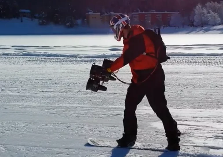 Professional snowboarder Jamie Barrow e-thrusts his way to 50 mph (80 km/h)