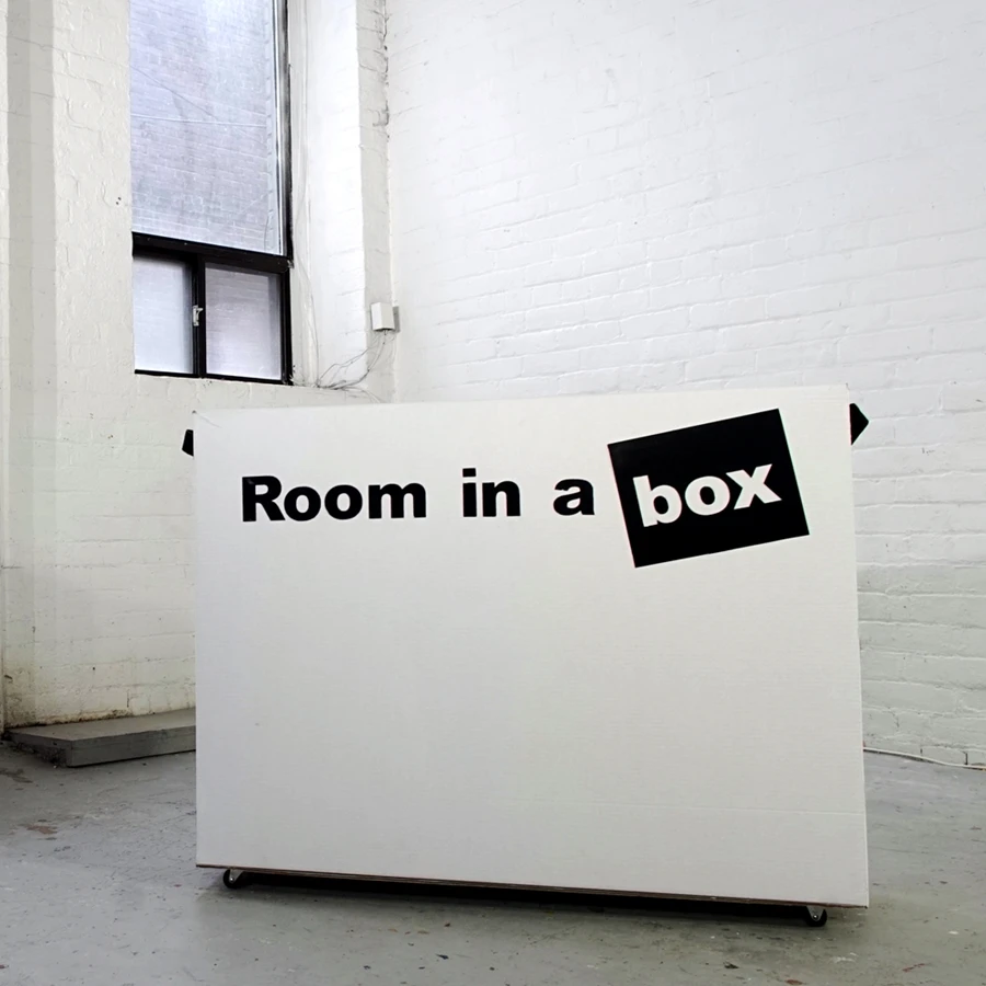 Each Room in a Box is delivered in a cardboard box on wheels that can be carried or wheeled around by one person
