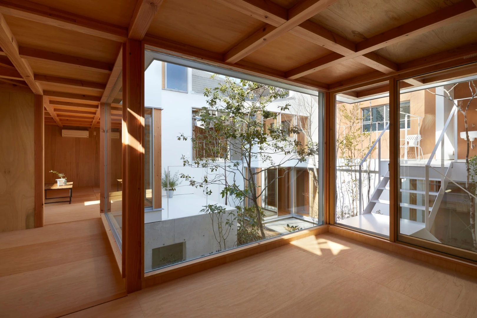 The two-story Loop House features a courtyard at its heart