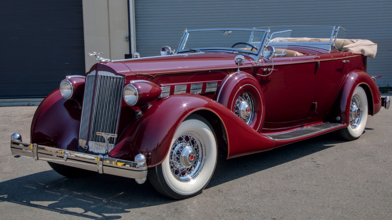 2018 Monterey Car Week Auction Report | 1936 Packard Super Eight 1404 Dual Cowl Sport Phaeton | Estimate: from $375,000 to $425,000 | Sold for $451,000 | Auction: Mecum | Lot S77.1 | Official Description