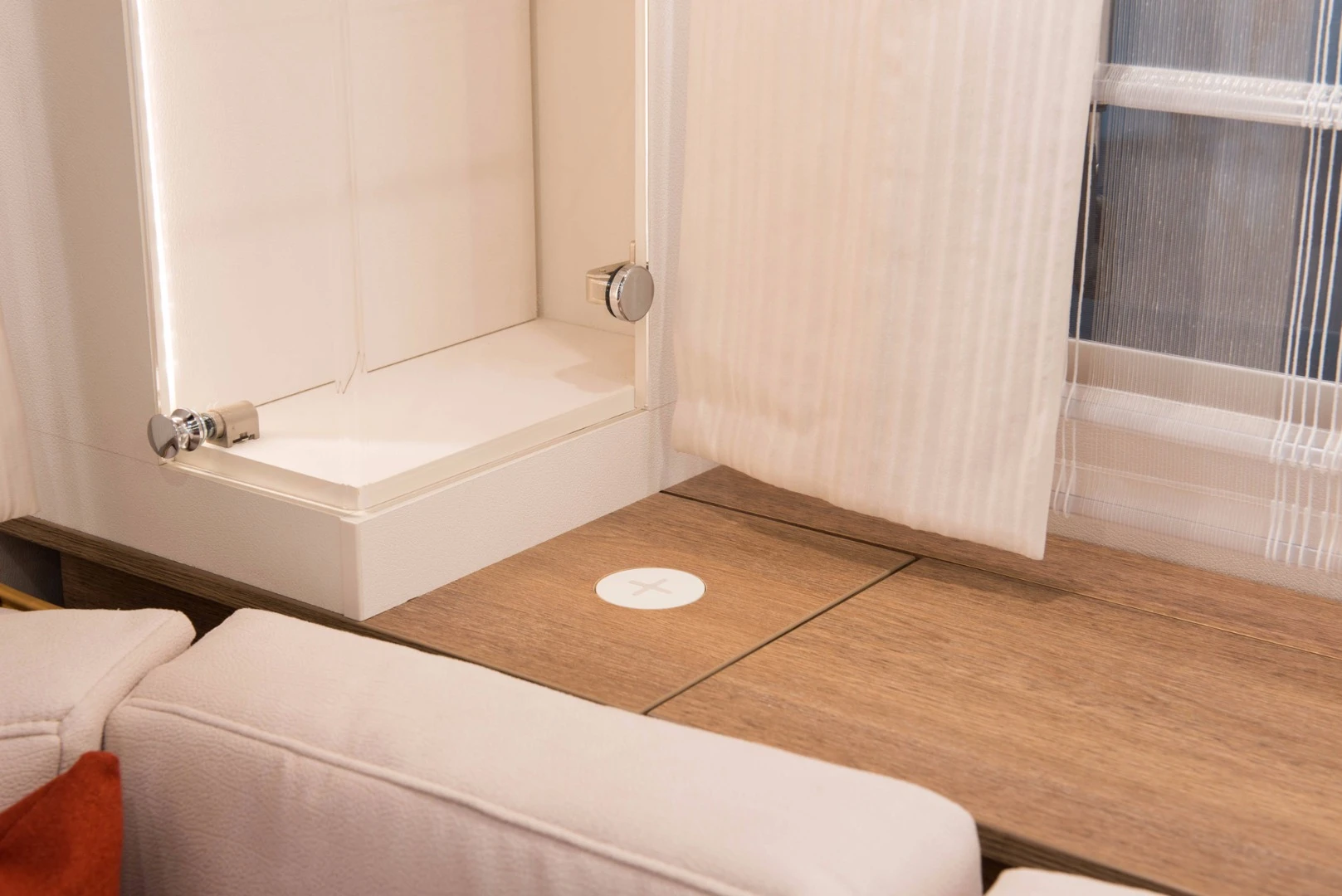 The circular wireless charging station adds convenience inside