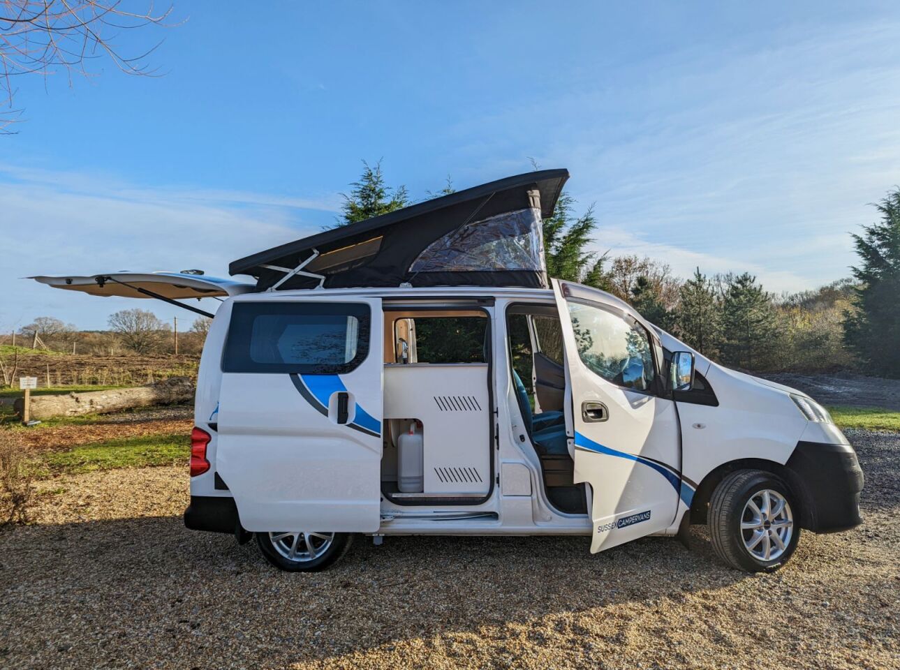 The Sussex CamperCar VX-E sleeps up to four people with folding bed and pop-up sleeper roof