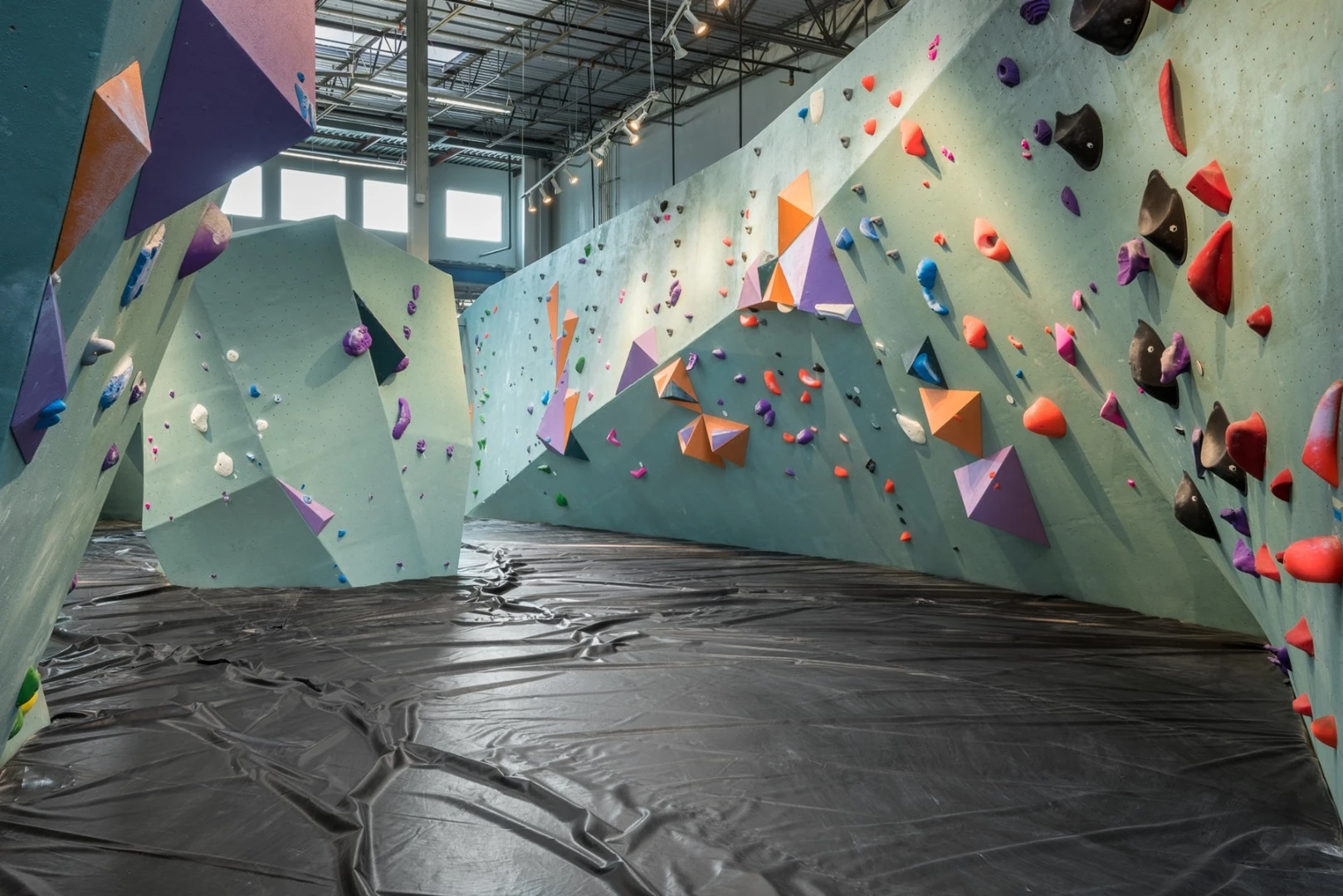 The Austin Bouldering Project has 250-300 problems and routes