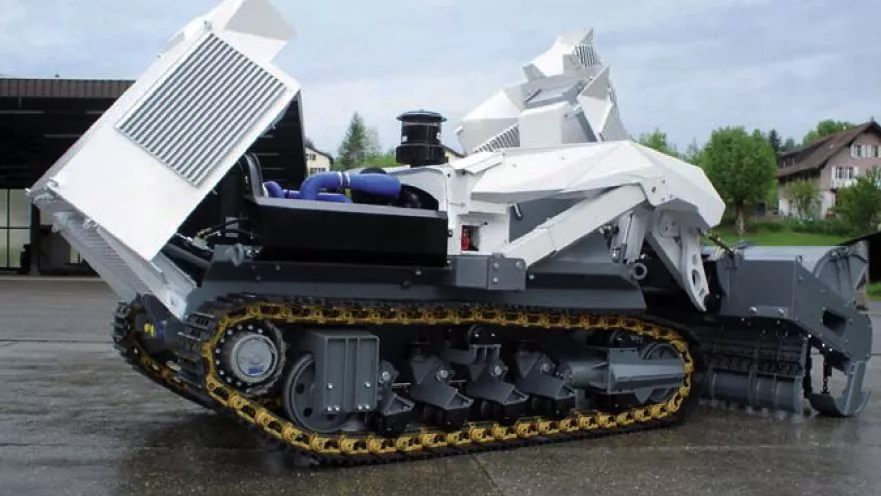 The D-3 is a robotic vehicle that uses a chain flail or tiller to detonate land mines (Photo: DIGGER DTR)