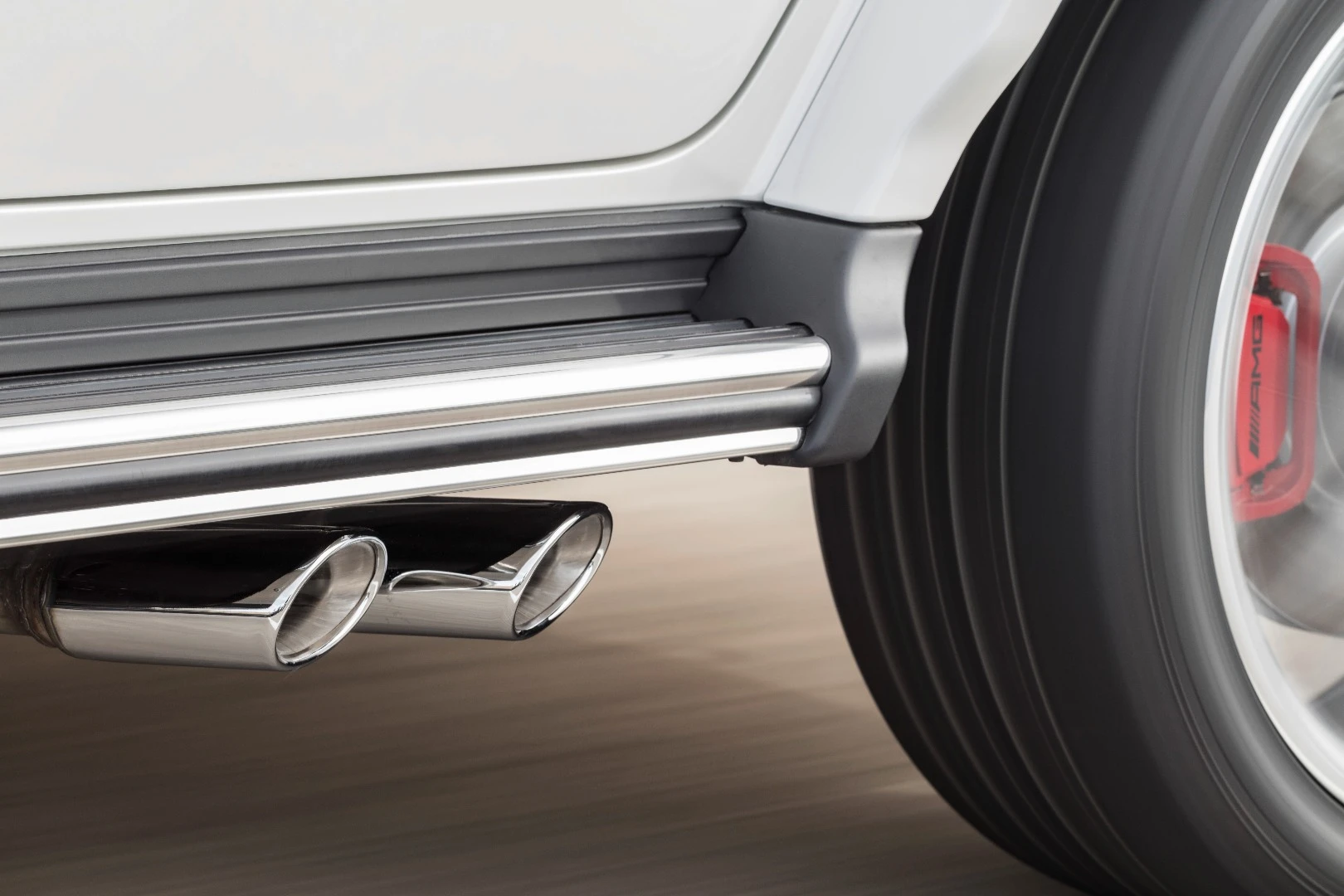 Chromed exhaust tips, emerging just underneath the running boards of the rear doors, are hallmarks of the Mercedes G Class