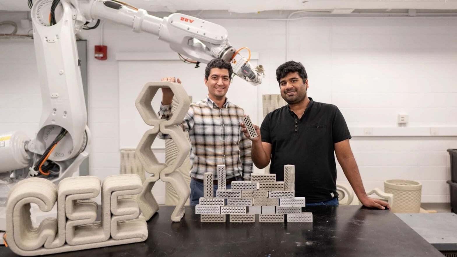 Princeton researchers Reza Moini and Shashank Gupta with their bio-inspired concrete