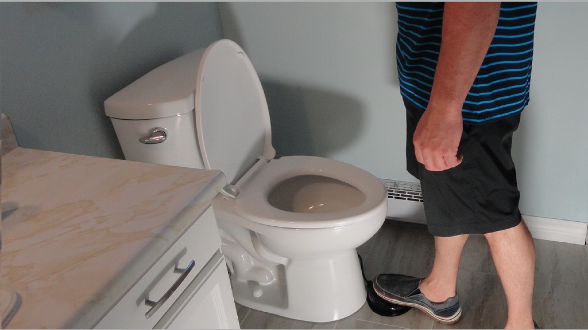 New gadget brings foot-flushing to home toilets