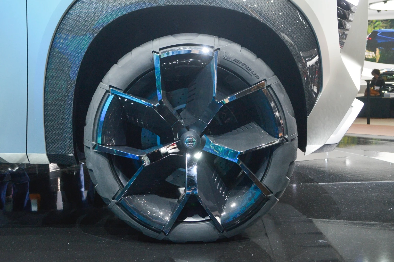 Nissan's Xmotion concept rides on metal-crafted wheels and all-terrain tires