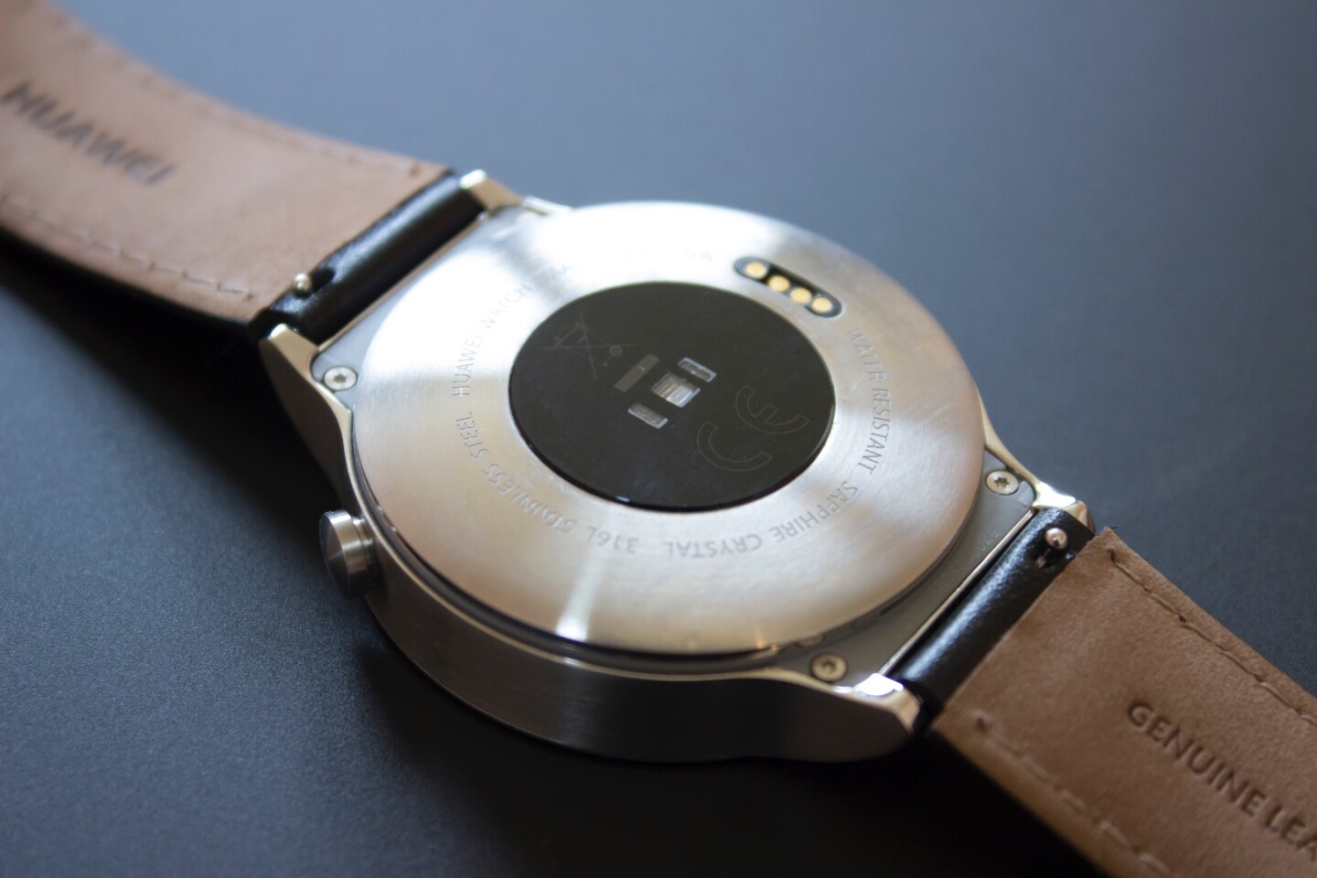 The Huawei Watch has a heart rate sensor on its backside, and quick-release sliders to easily remove the watch band