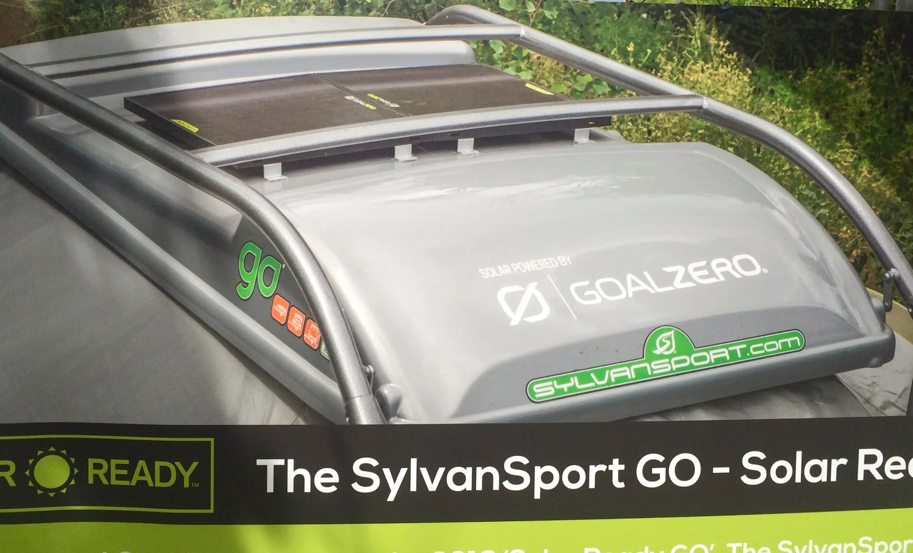 We don't think SylvanSport would have appreciated us climbing up the open trailer for a photo, so we settled for a photo of the brochure showing the roof-mounted solar panels