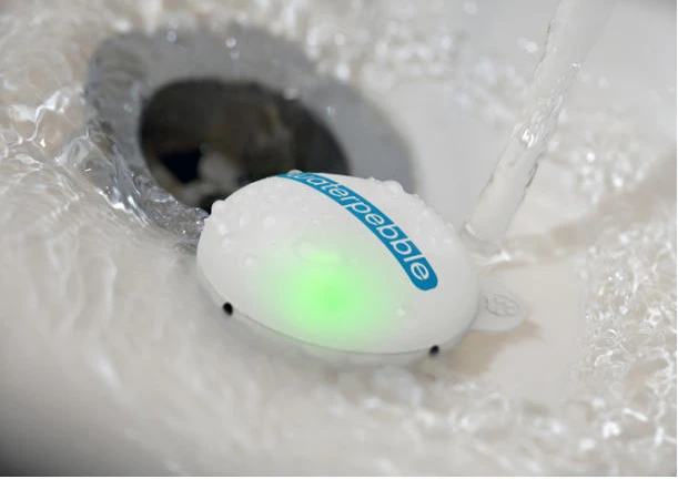 Water Pebble helps you to stop wasting water by taking too long in the shower (Photo: Priestmangoode)