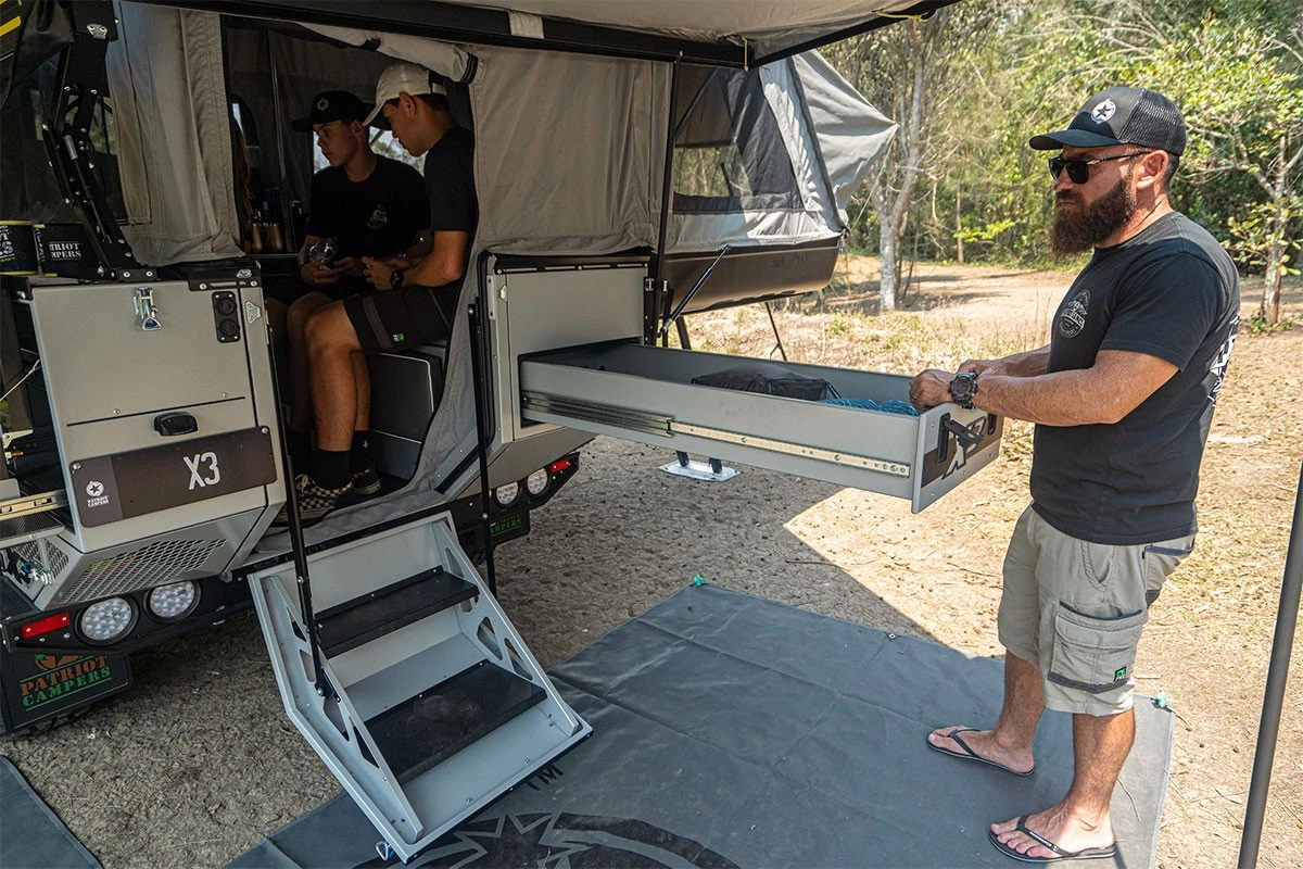 Long storage drawer next to the entry