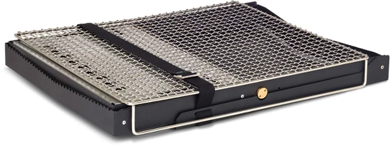 The grill grate tops the folded Primus Kamoto body for easy transport