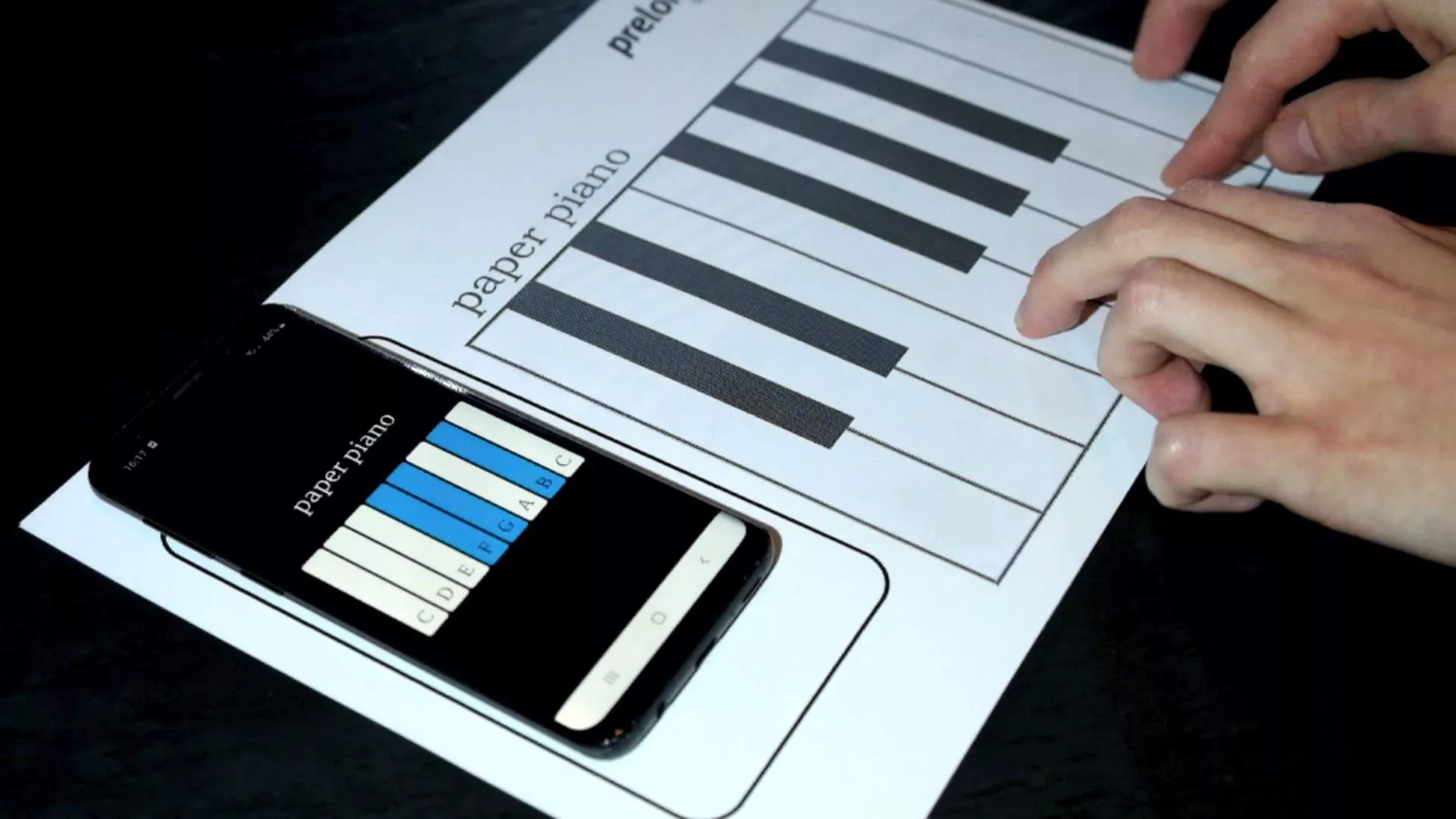 Printed circuits, ordinary paper and NFC technology combine for a piano keyboard that's played on a smartphone