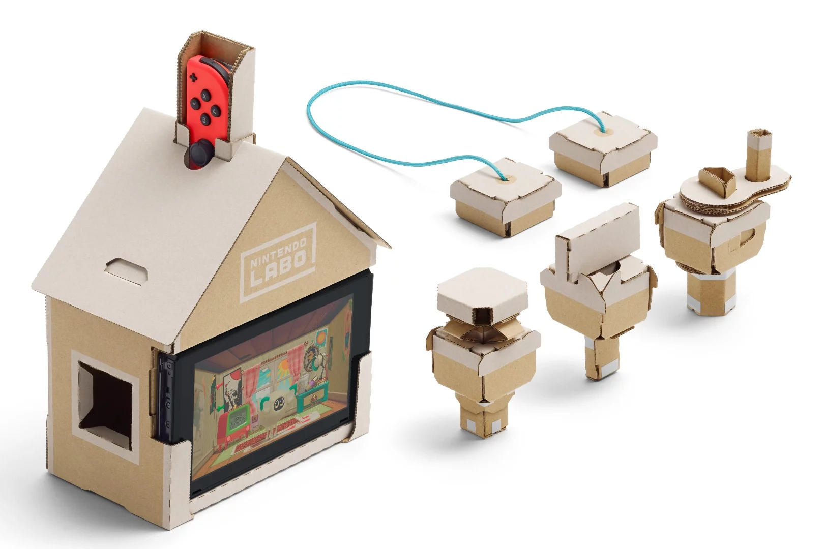 The Nintendo Labo Toy-Con House is controlled by inserting different shapes into the side, which bring different virtual objects into the game on the screen