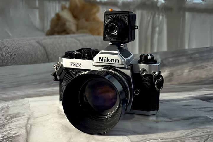 The Ligar camera (top) captures digital copies of images taken by a host film camera