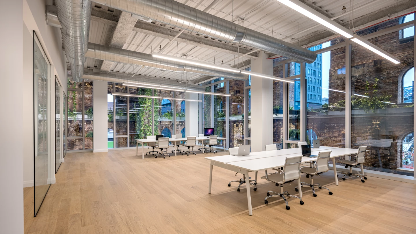 The Refinery at Domino serves as a modern office space with floor-to-ceiling windows