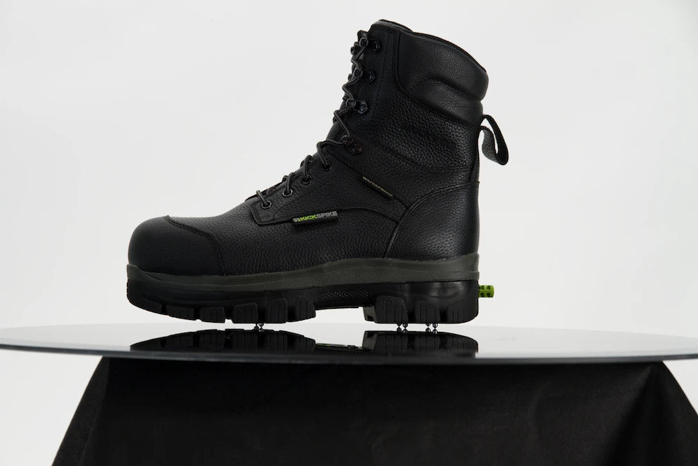 KickSpikes feature a mechanism in which the user simply kicks a protruding heel-located button against the ground to either deploy or retract six metal spikes that are built into the sole