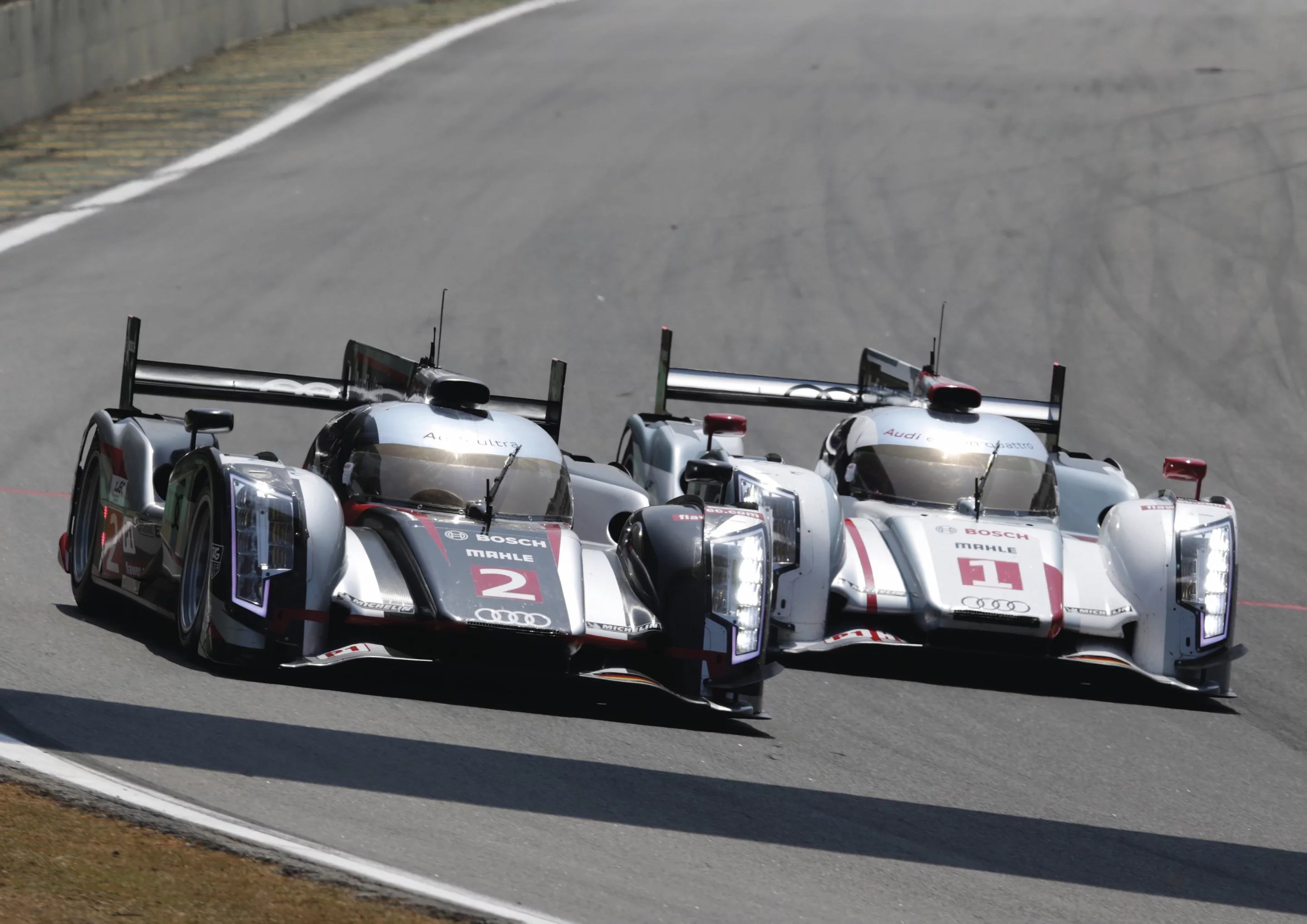 The two Audi cars - one with the hybrid system and one without