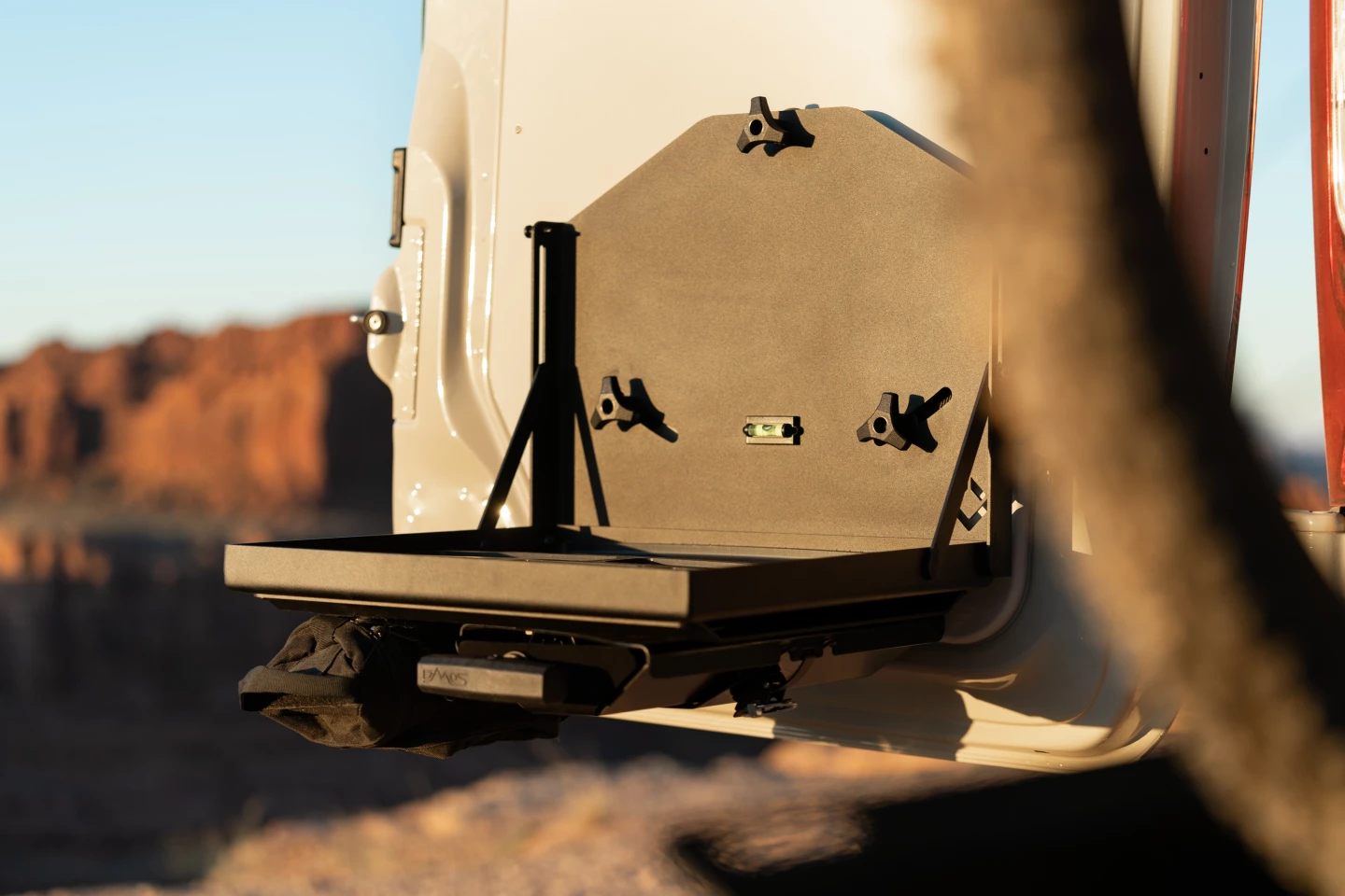 The super well thought-through bench is more convenient than a folding camp table, folds away to save space and easily levels at camp