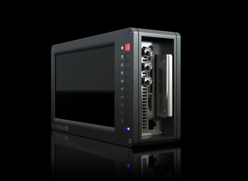 A close up showing the physical interface buttons next to the seven inch touchscreen display