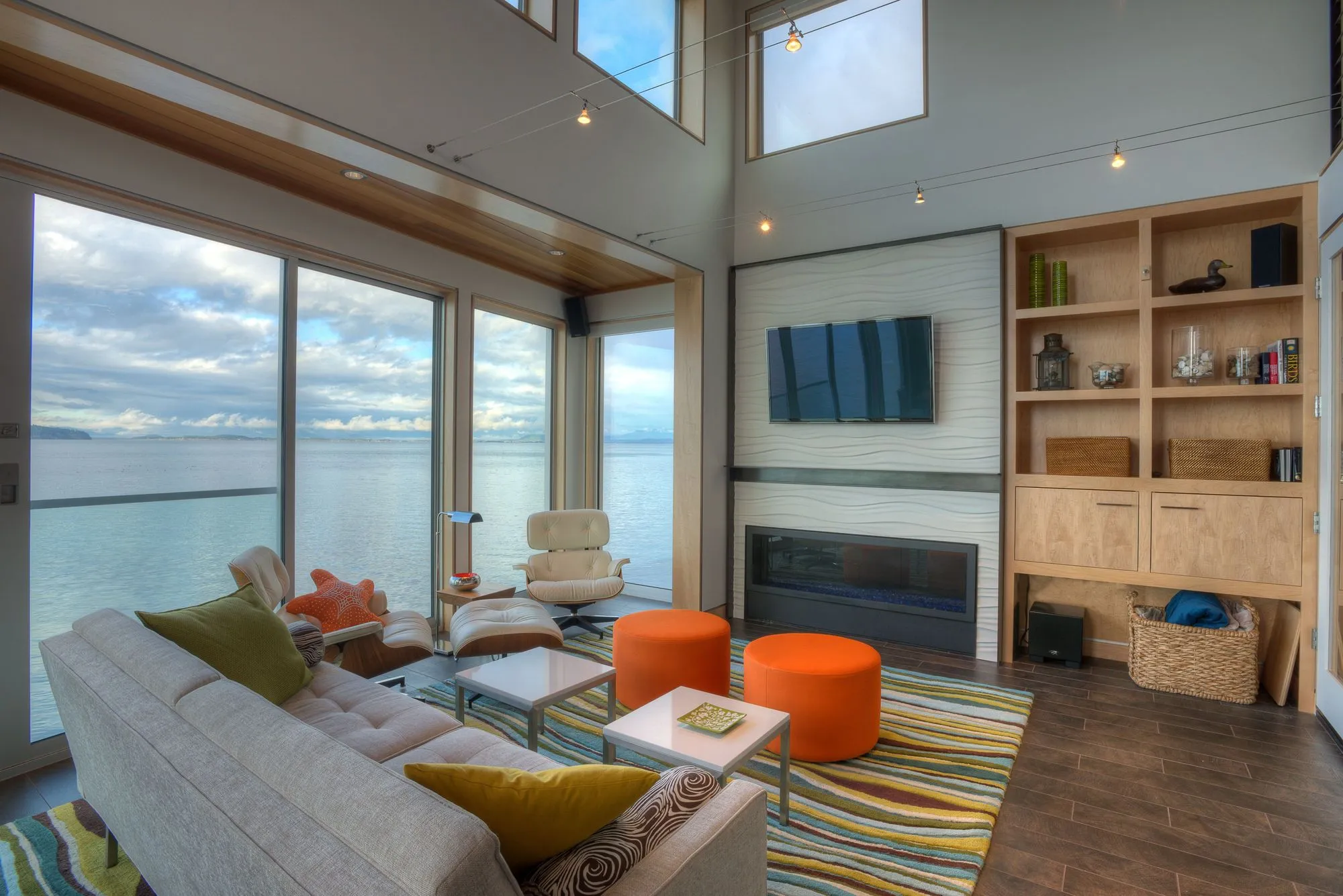 The main living area is on the second floor, accessed via tough bent plate steel stairs(Photo: Lucas Henning)