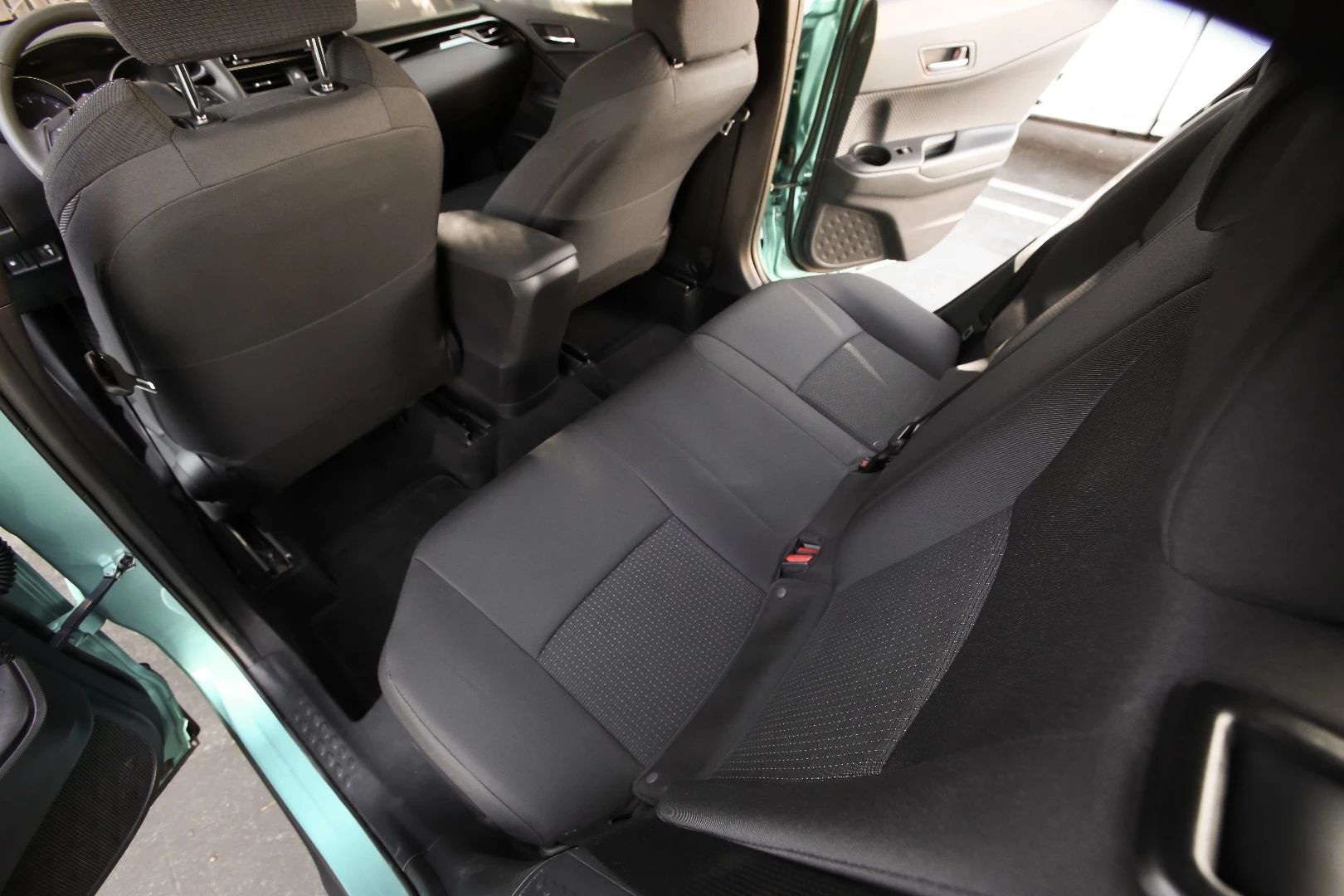 The rear seating is cramped, but no more so than it is in any other compact you might name. Headroom back there is commendably good