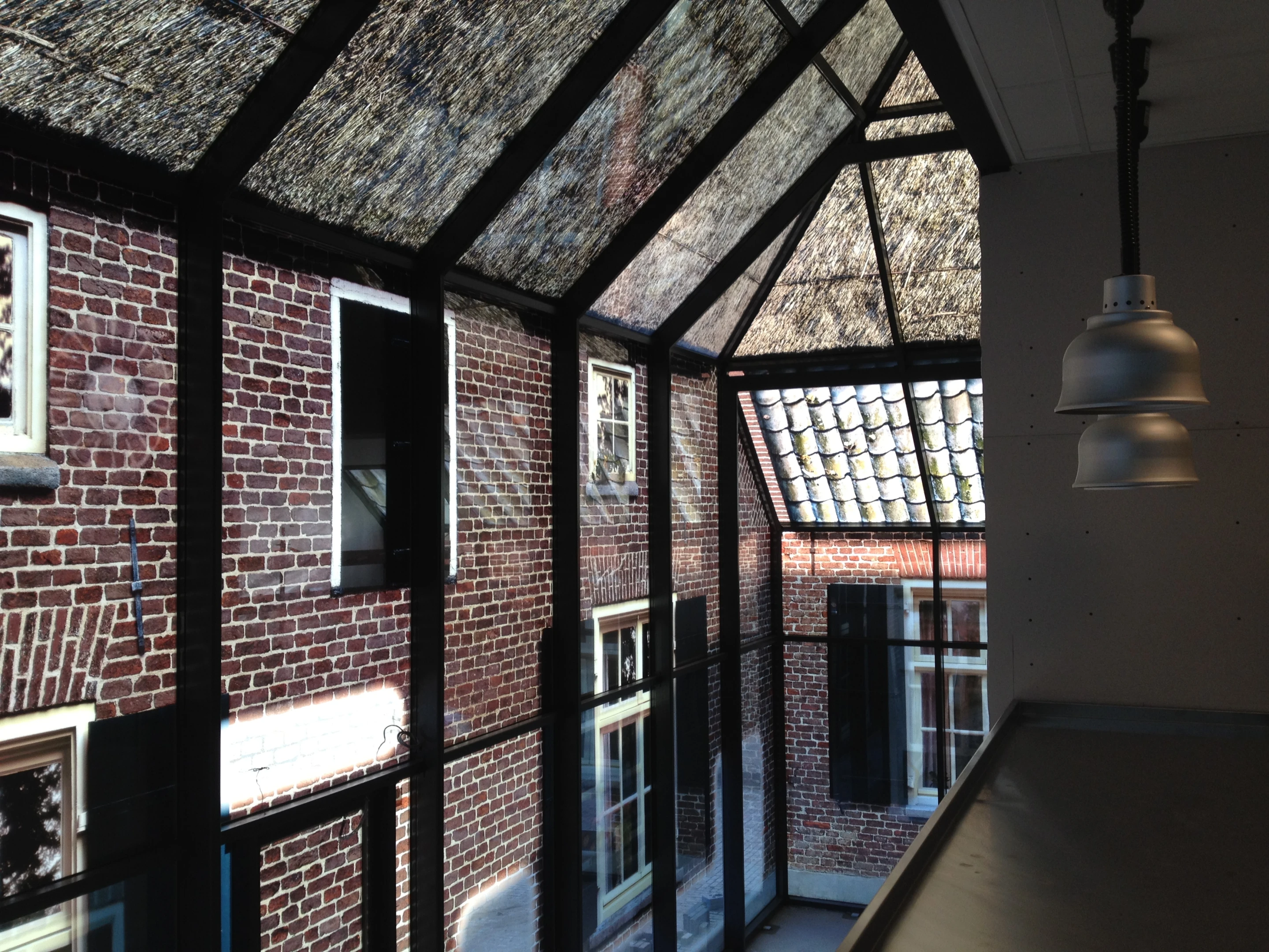 The image of a typical local farm building has been fritted into the glass (Photo: MVRDV)