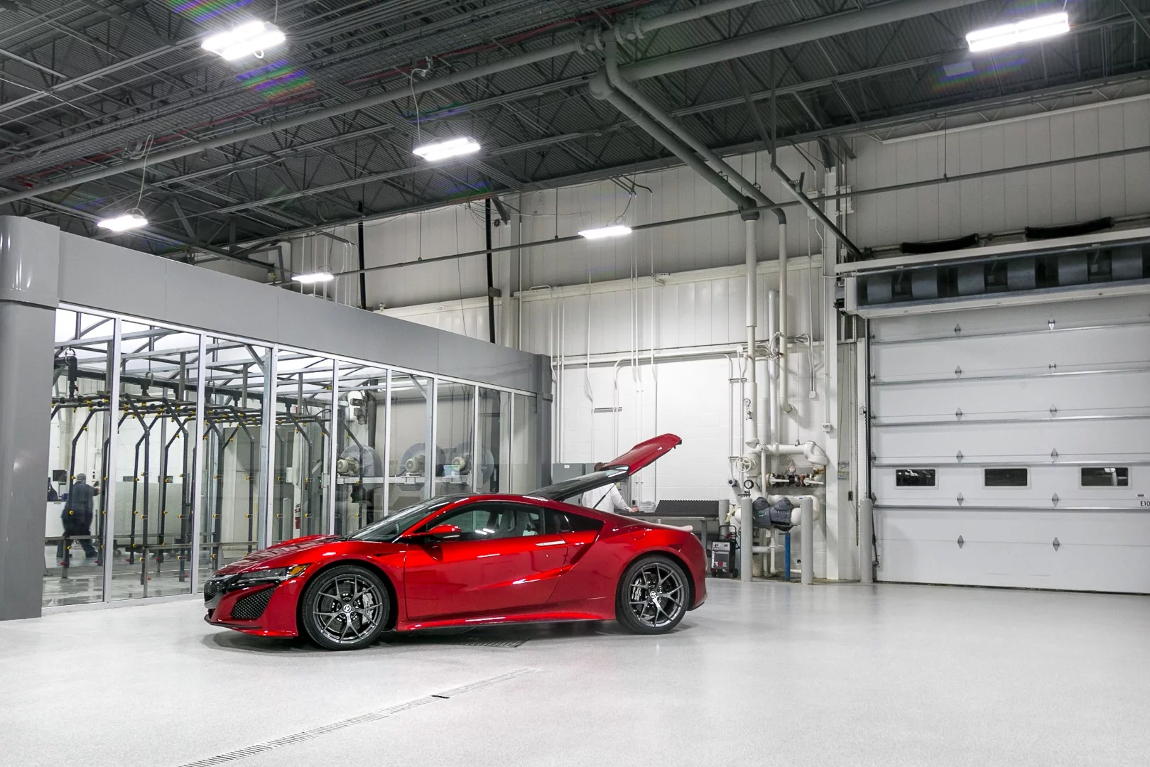Acura NSX: Composite SMC panels are used for the fenders, thin sheet aluminum for the hood and hatch, and hydro-formed aluminum for the doors