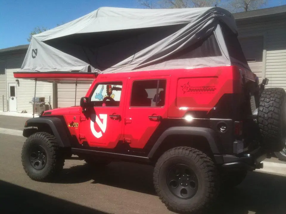 The J180 uses a fold-over roof tent