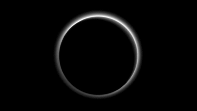 Backlit image of Pluto showing atmospheric haze