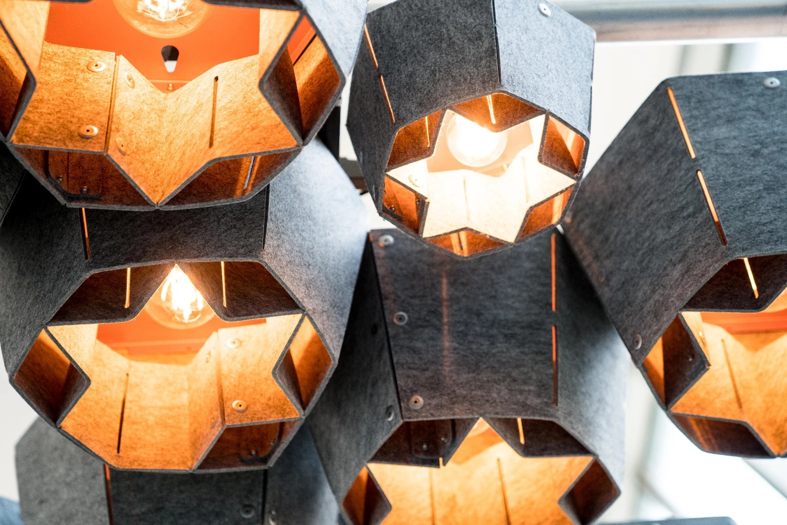 Barnacles found on the skin of a whale inform the shape of the Plastic Whale lamp