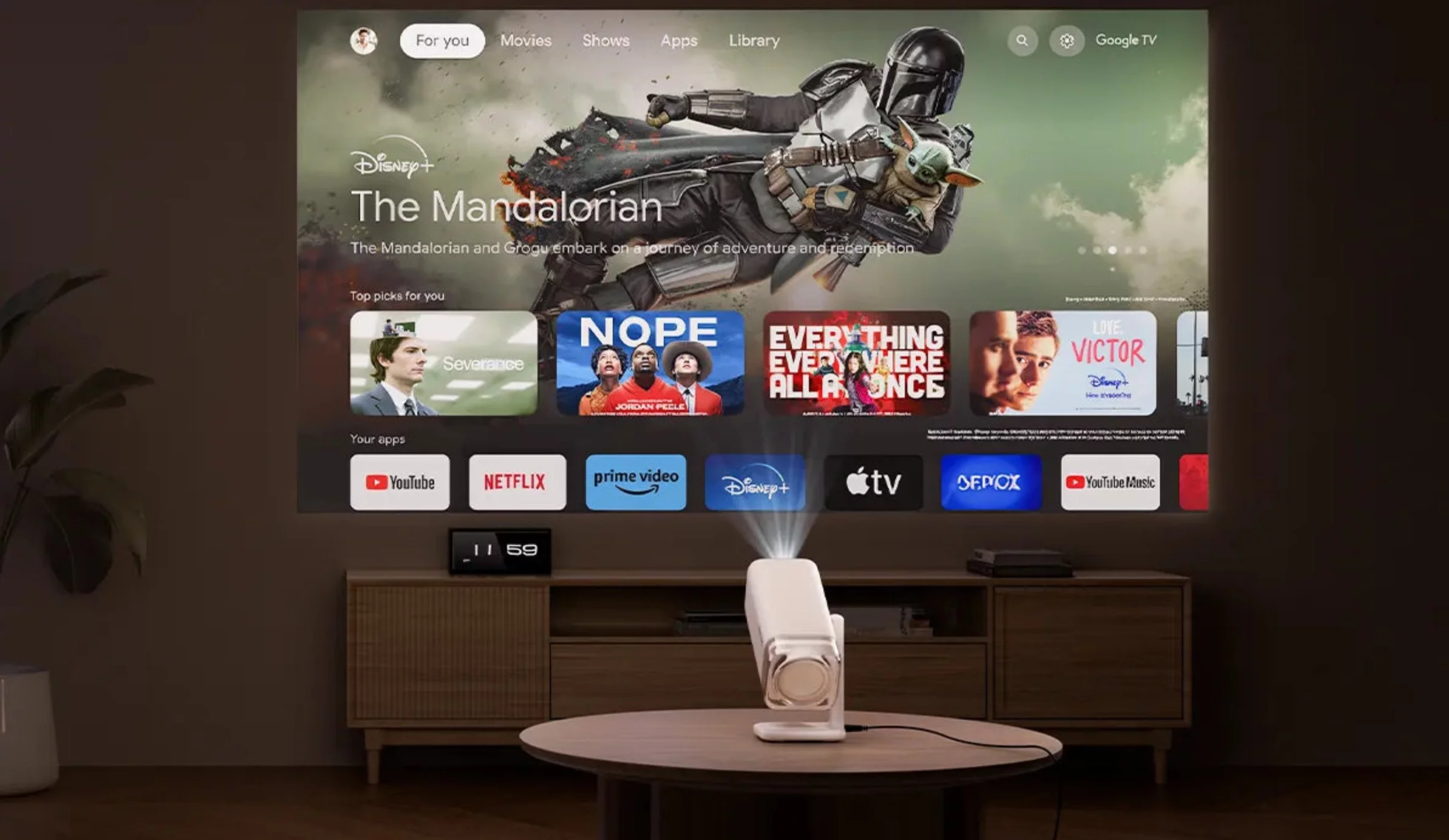 "This striking searchlight-style projector packs a powerful audio system and smart TV functionality into a compact, go-anywhere design, eliminating the need for extra speakers or streaming devices"