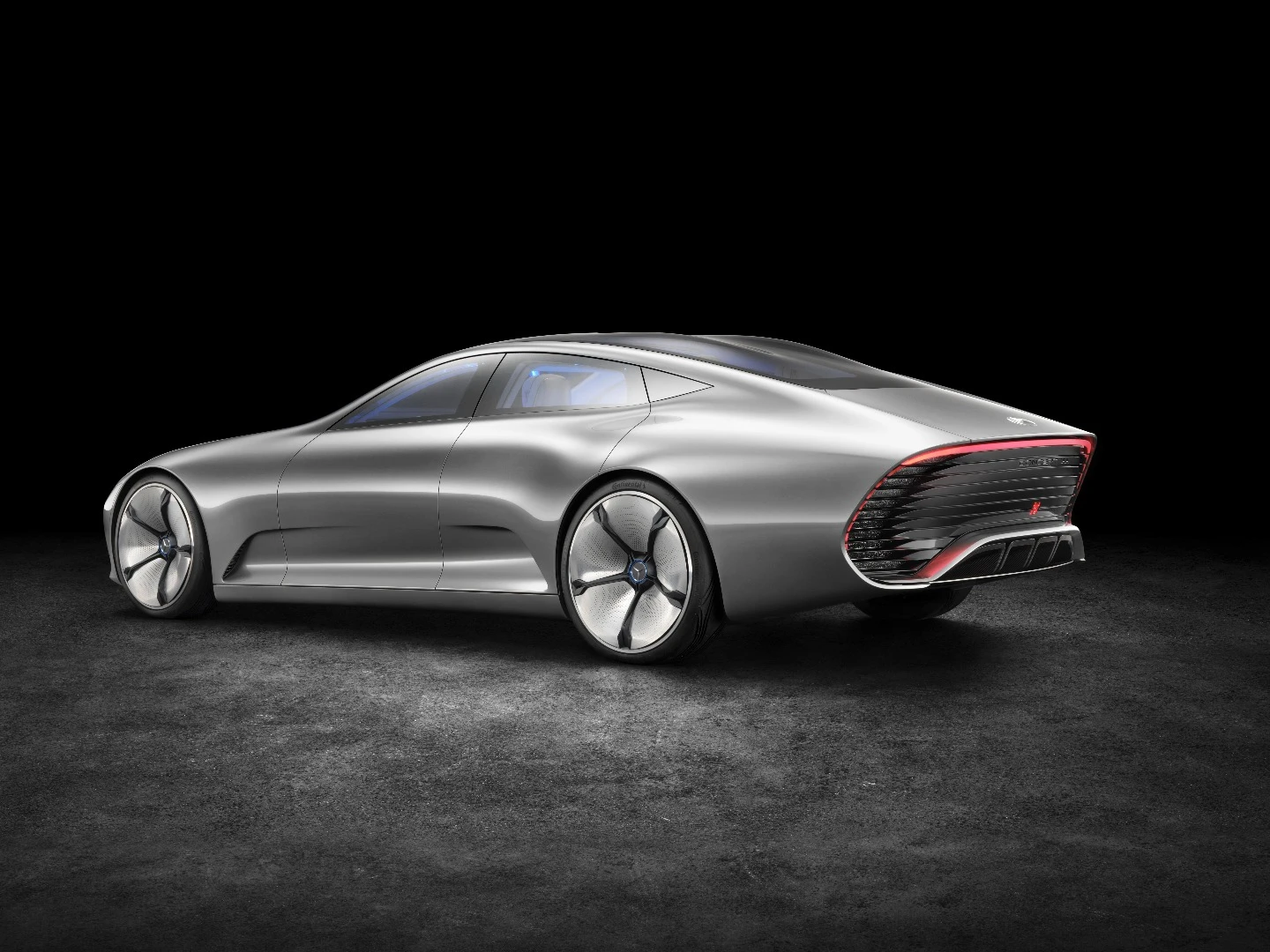 The car's sloping rear end is reminiscent of the tail on the CLA or CLS Coupe