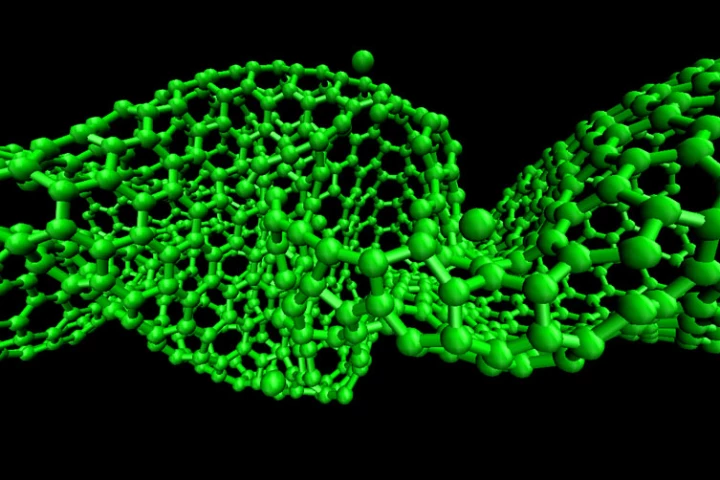 Scientists have discovered that tiny sonic booms cause carbon nanotubes to shear off from their graphene host material, by pressing in on them from either end (Image: Kim Lab/Brown University)