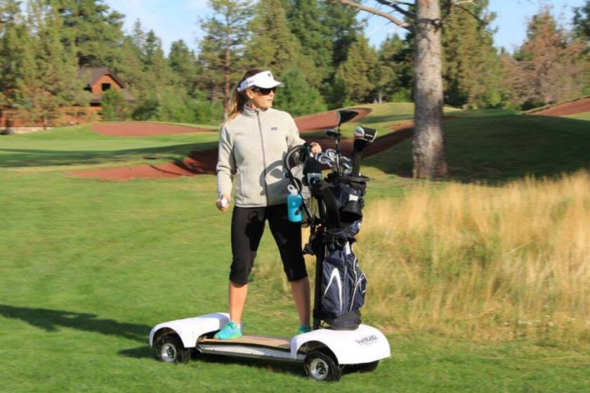 Riders can choose between using a bag mount/stability handle (seen here), carrying their bag while using the optional foot straps, or “freeriding”