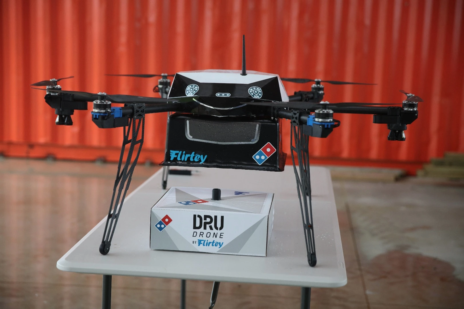 The pizza giant will use US-based drone startup Flirtey's aircraft for the service