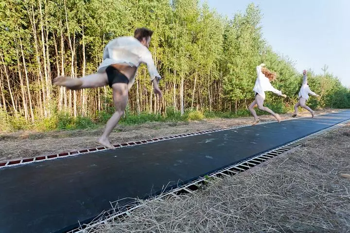 Fast Track invites visitors to playfully bounce along the extended trampoline road