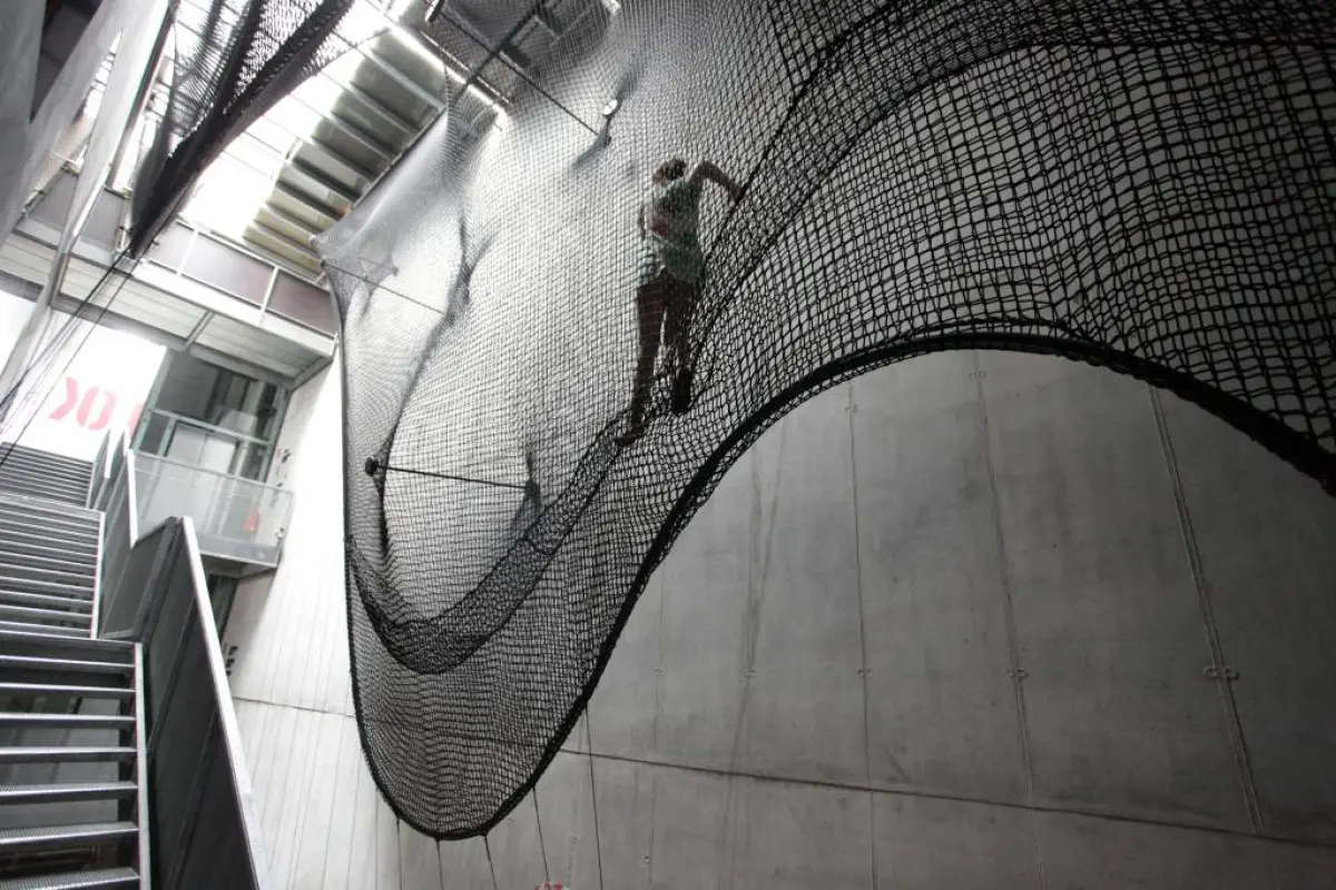 Net Linz is a rope-based installation at the OK Center for Contemporary Art, that people can climb as a means of moving between floors