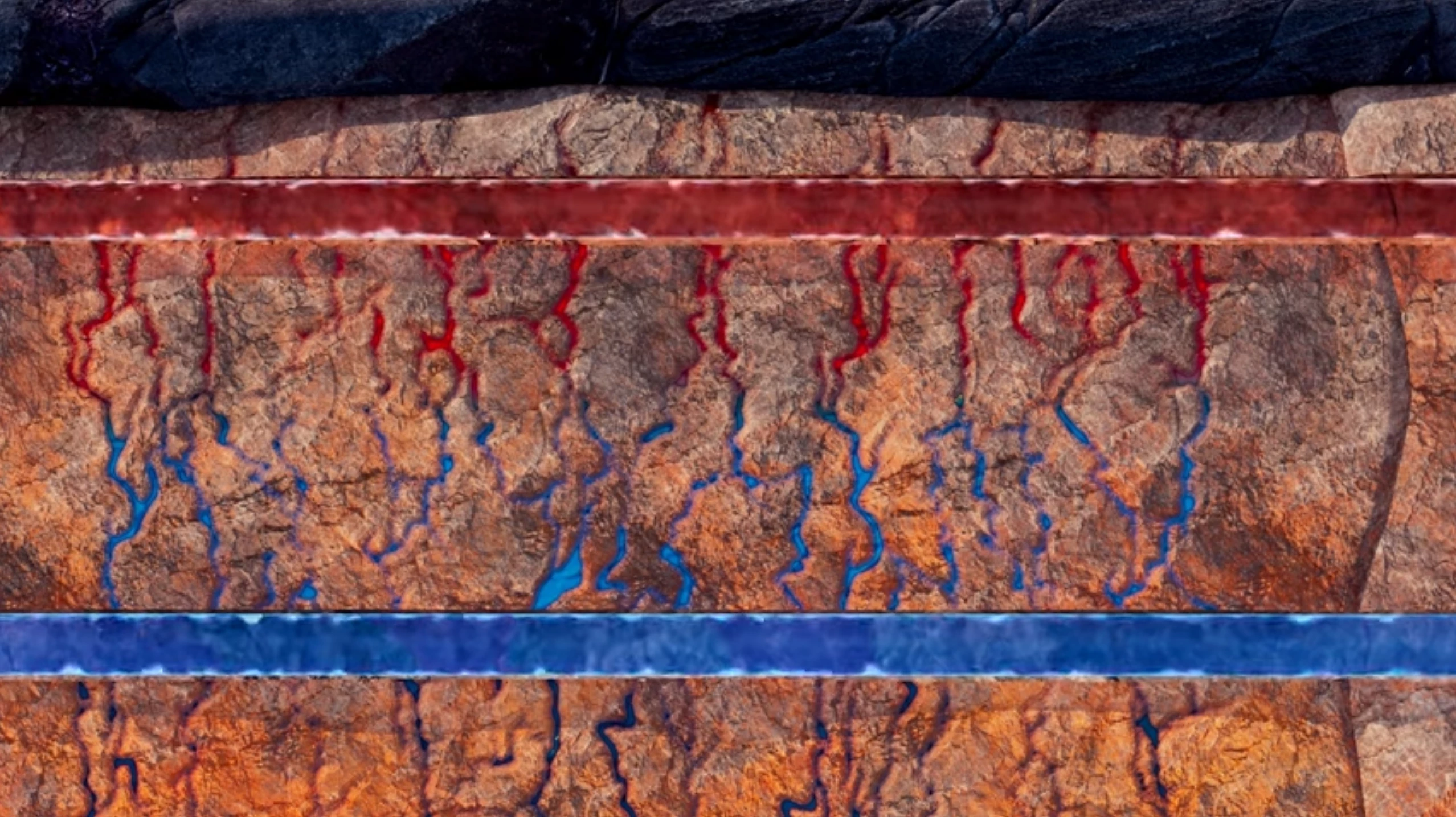 Cold water is injected into the fractured rock from below, where it rises into the second horizontal pipe, gathering heat from the rock and taking it back up to the surface