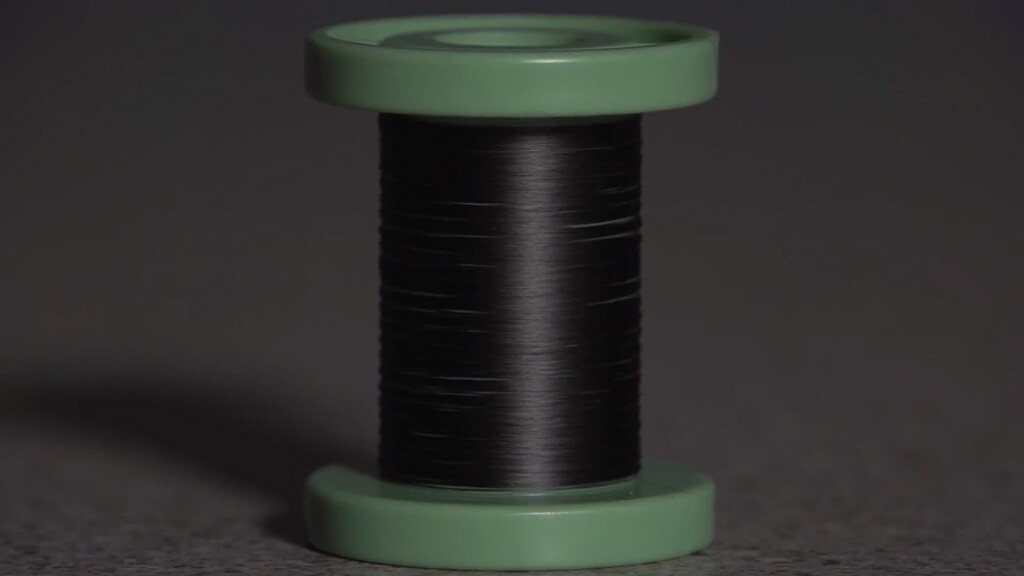 Threadlike carbon nanotube fiber combines strength, flexibility and
