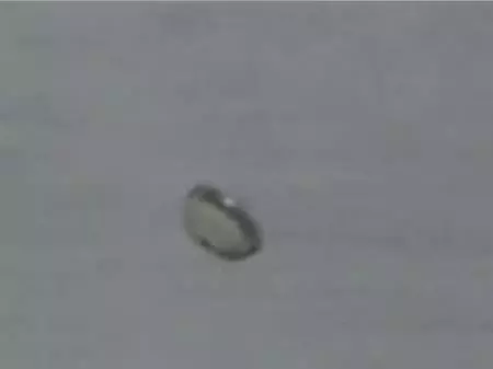 The Genesis capsule returning to Earth