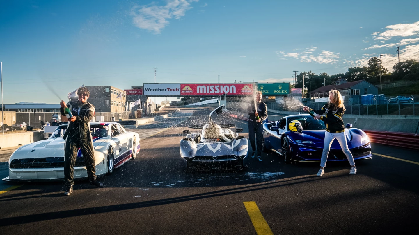 The McMurtry Spéirling electric fan car takes the top spot at the Reverse Corkscrew Hillclimb, next to its top competitors