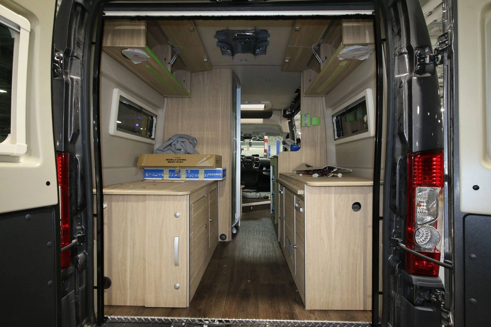 The folding rear bed clears out the aisle for gear hauling