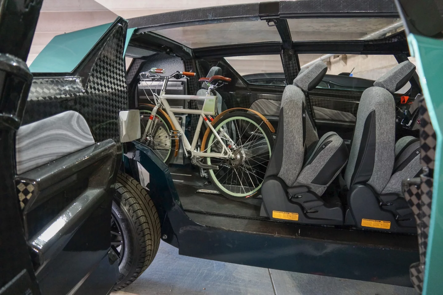 The seats slide and collapse, making room for cargo