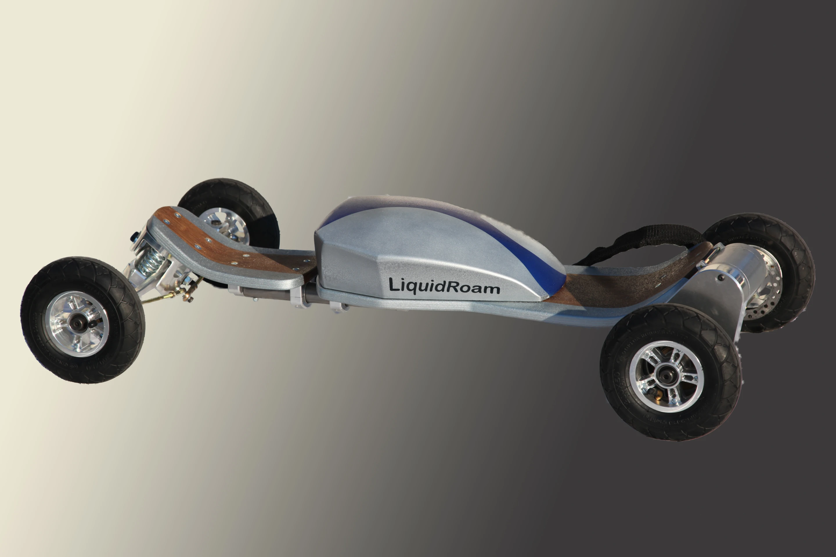 The above-board tank contains the vehicle's electronics, its Li-Polymer battery pack and onboard charger
