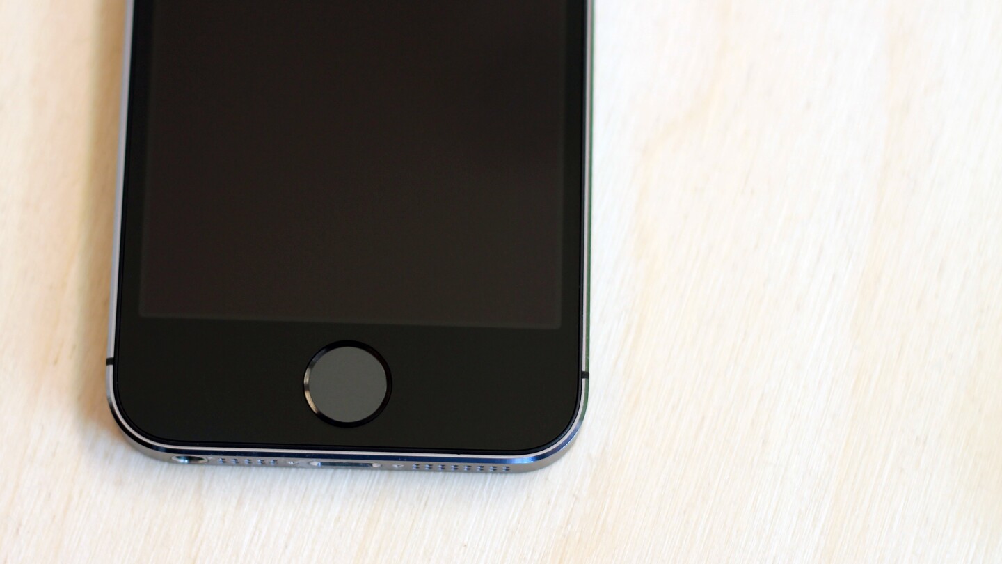 The iPhone 5s' Touch ID fingerprint sensor lives beneath that redesigned home button