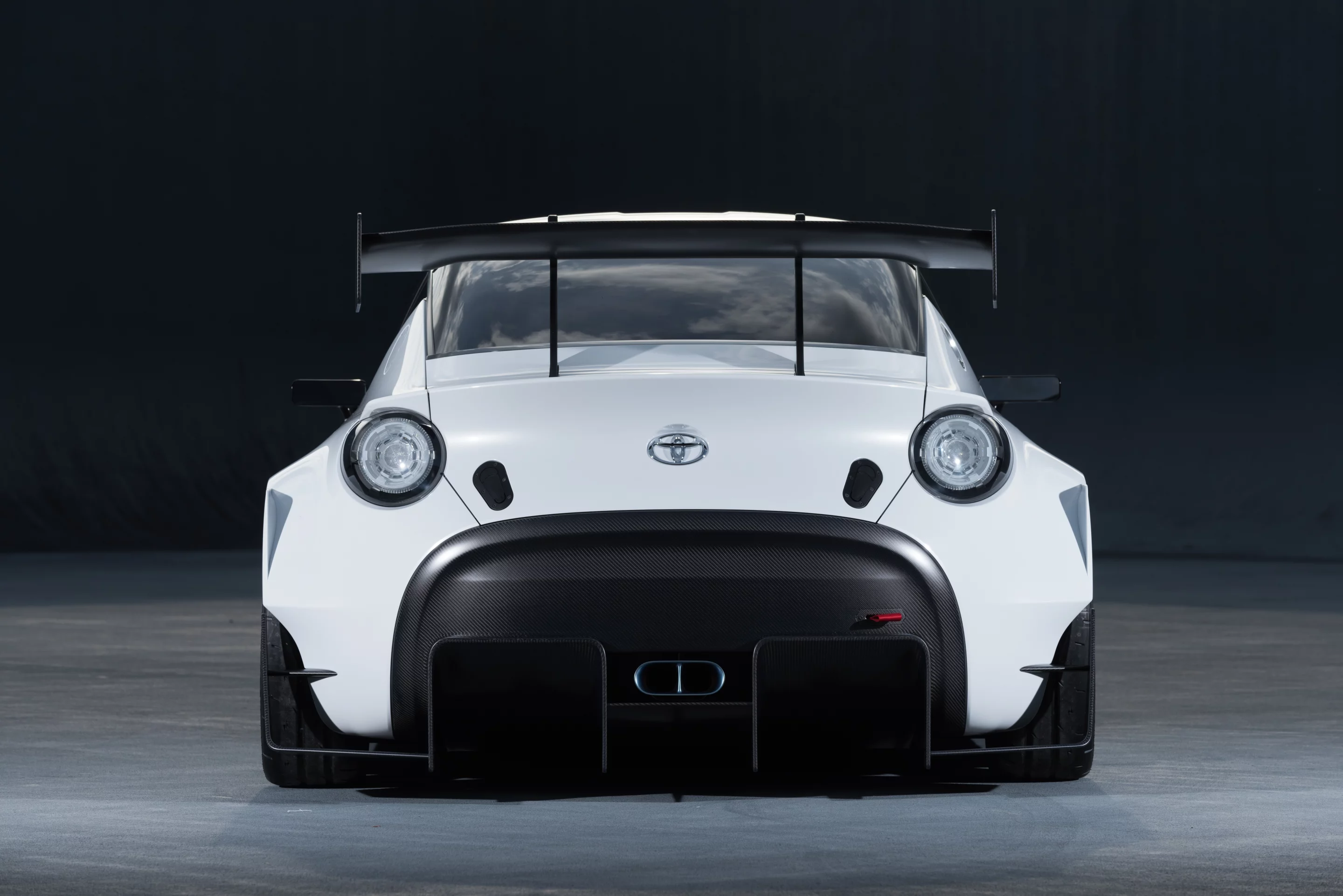 We're not sure about the amount of downforce those add-ons provide, but they do look cool